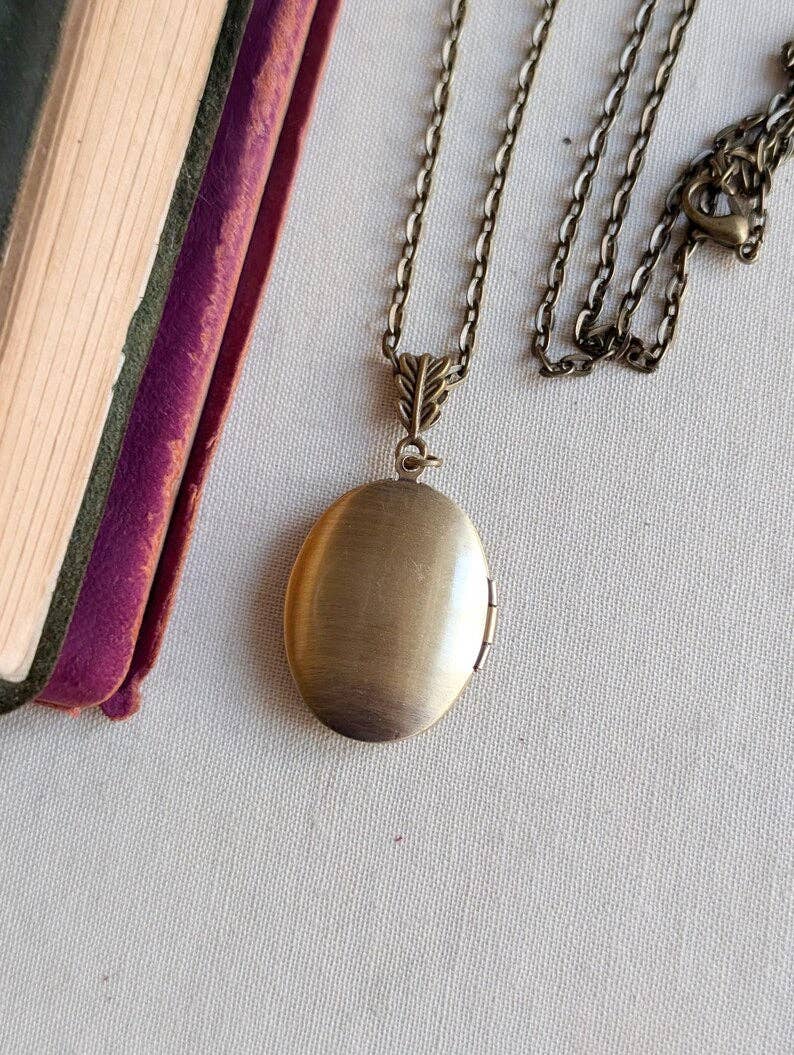 Floral Embossed Oval Locket Necklace