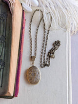 Floral Embossed Oval Locket Necklace
