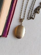 Floral Embossed Oval Locket Necklace