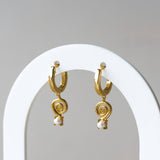 Spiro Earrings with a pearl and spiral pendant