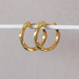 Renzo Twisted hoops earrings in gold